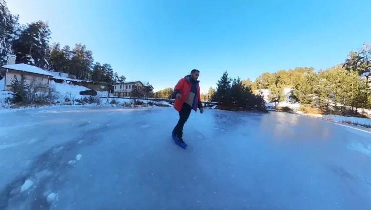 Buz tutan gölde patenle kaydı
